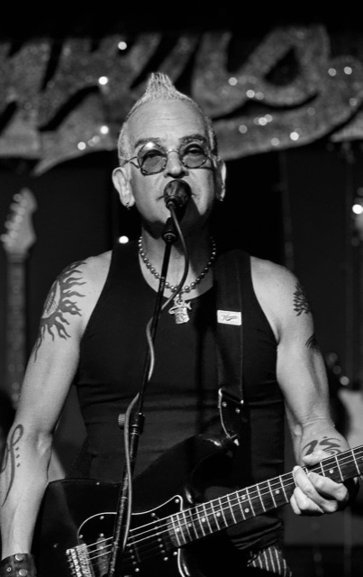 Rik Avalos at the mic, black and white